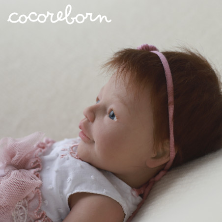 Anuk niña pelo castaño, ojos azules, piel clara